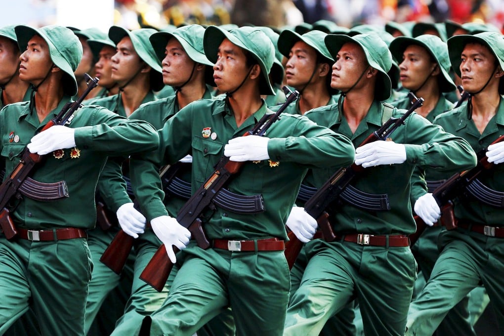 Vietnamese soldiers of Liberation Force march during a military parade as part of the 40th anniversary of the fall of Saigon. Photo: Reuters