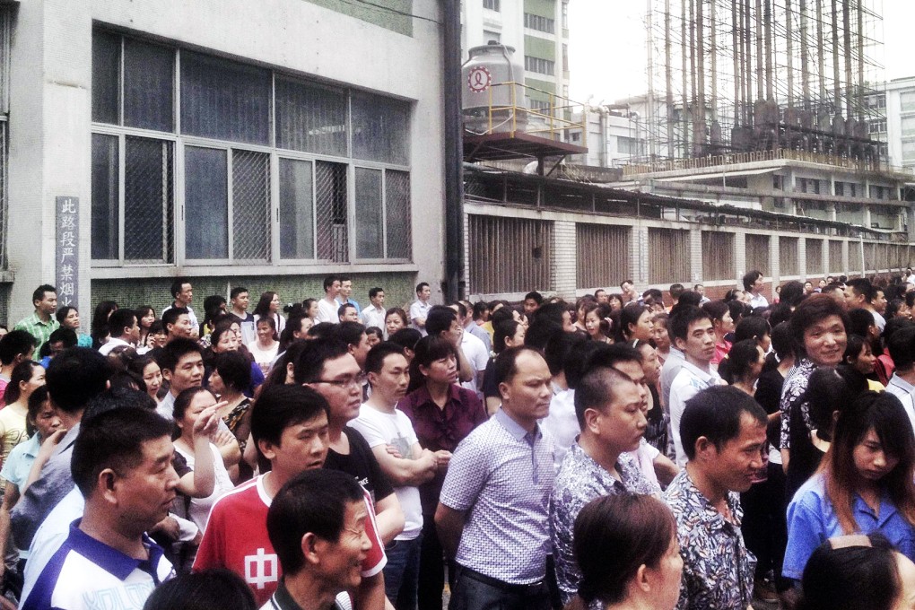 Strikers taking part in an industrial dispute at the shoe manufacturer Yue Yuen in Dongguan in Guangdong province last year. Photo: Reuters