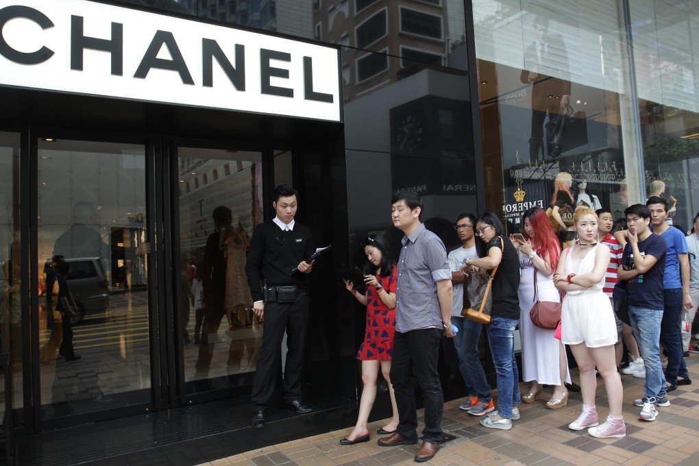 Queues appeared at luxury brand stores on Canton Road in Tsim Sha Tsui yesterday as tourists flocked to Hong Kong. Photo: Dickson Lee