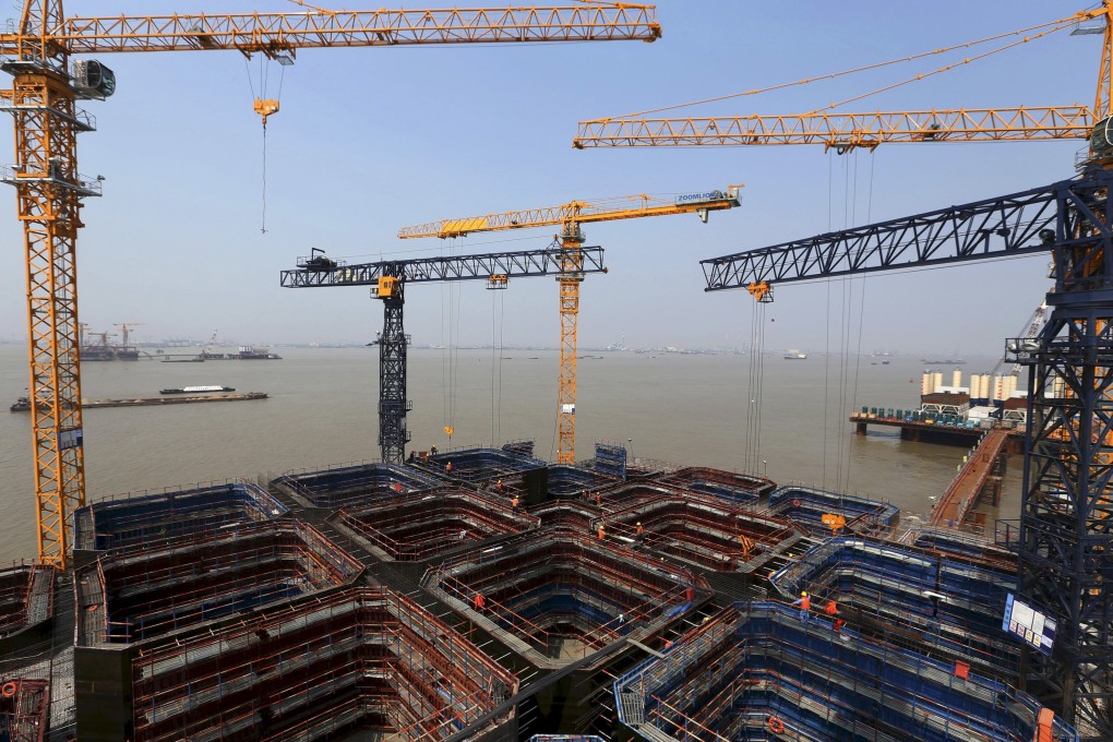 Construction work on a pier and bridge in Nantong in eastern Jiangsu province. The central government is keen to increase investment in infrastructure projects to boost the economy. Photo: Reuters