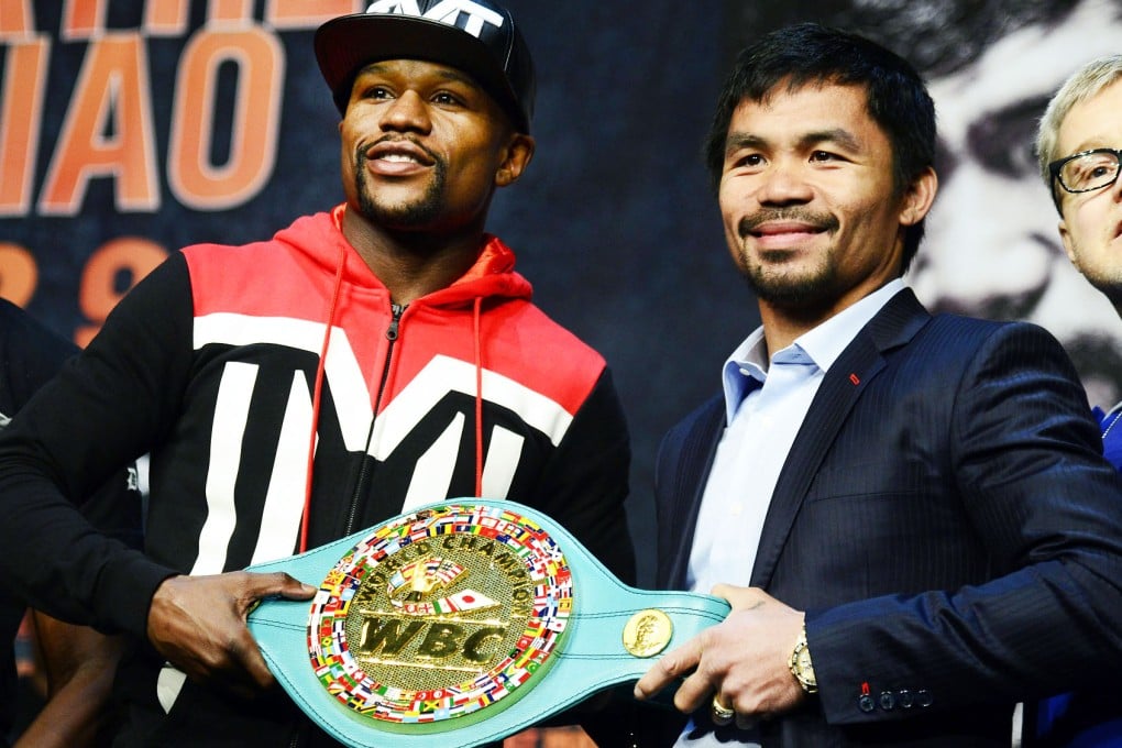 Filipino boxer Manny Pacquiao (right) fights American Floyd Mayweather (left) tomorrow in what is dubbed the 'fight of the century'. Photo: EPA