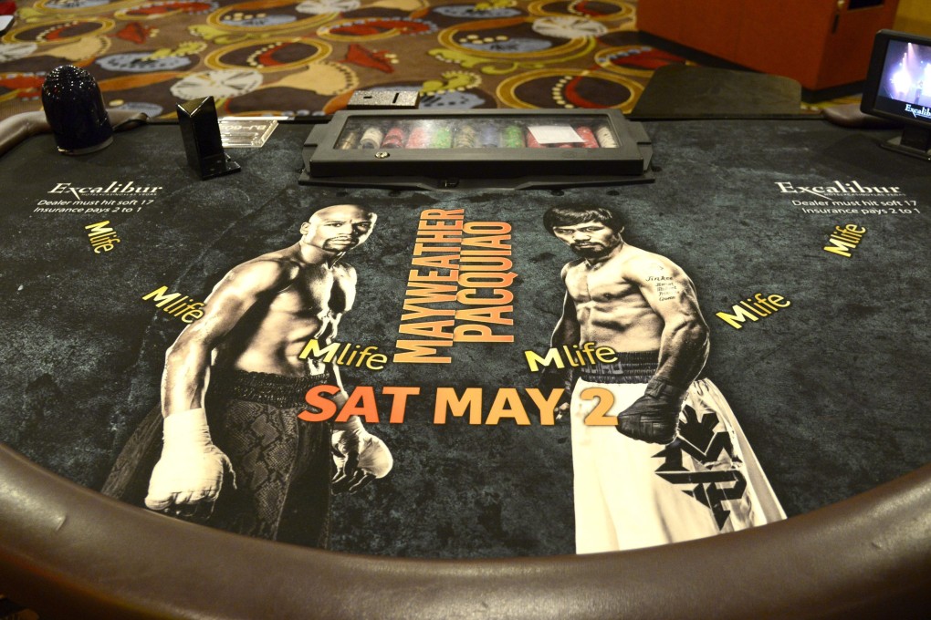 Gamblers in Las Vegas casinos are being encouraged to place their bets on the Mayweather-Pacquiao fight. The much anticipated showdown is drawing more money at the betting window than any fight before it. Photo: EPA