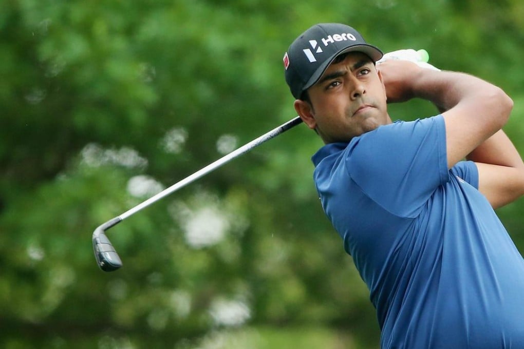 India's Anirban Lahiri hits a shot at Augusta National. Photo: AFP