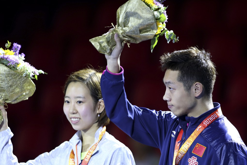 Xu Xin and Yang Ha-eun celebrate. Photo: AP