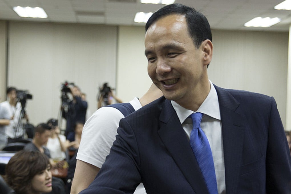 Kuomintang Chairman Eric Chu attends a press conference in Taipei on the eve of his visit to the mainland. Photo: Xinhua
