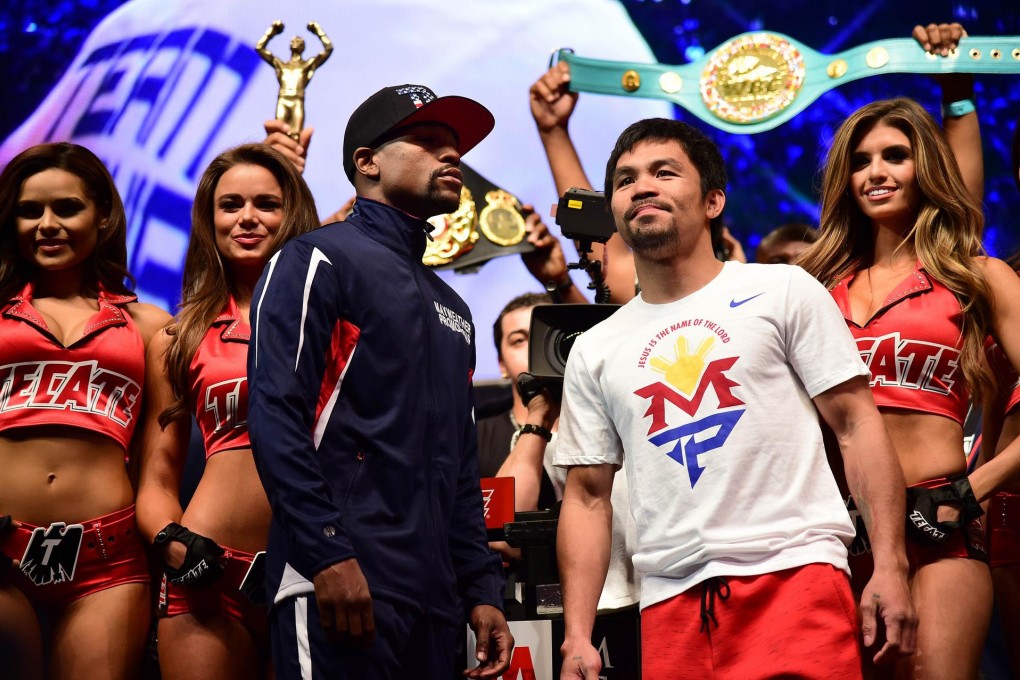 Floyd Mayweather and Manny Pacquiao at their weigh-in where they shared the same space for the last time before facing each other in their long-awaited welterweight title clash at the MGM Grand Garden Arena in Las Vegas. Photo: AFP