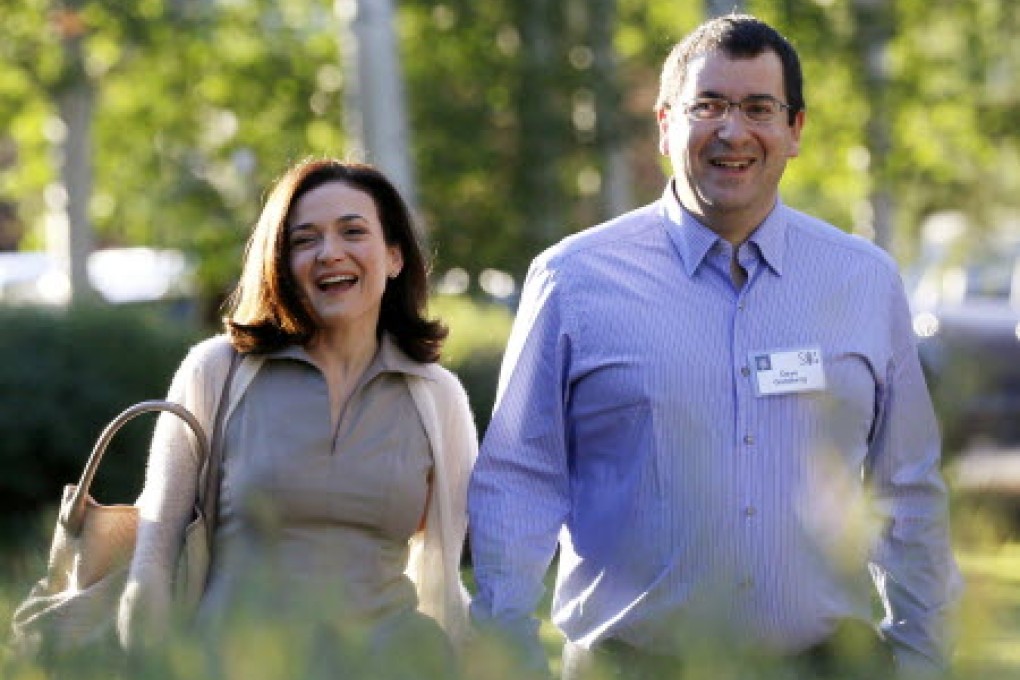 Sheryl Sandberg, Chief Operating Officer (COO) of Facebook, with her husband David Goldberg. Photo: Reuters
