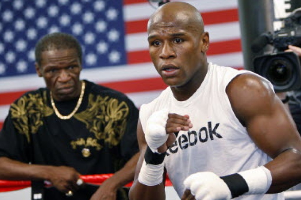 Floyd Mayweather Snr looks on as his son trains for his welterweight megafight with Manny Pacquiao. Photo: AP