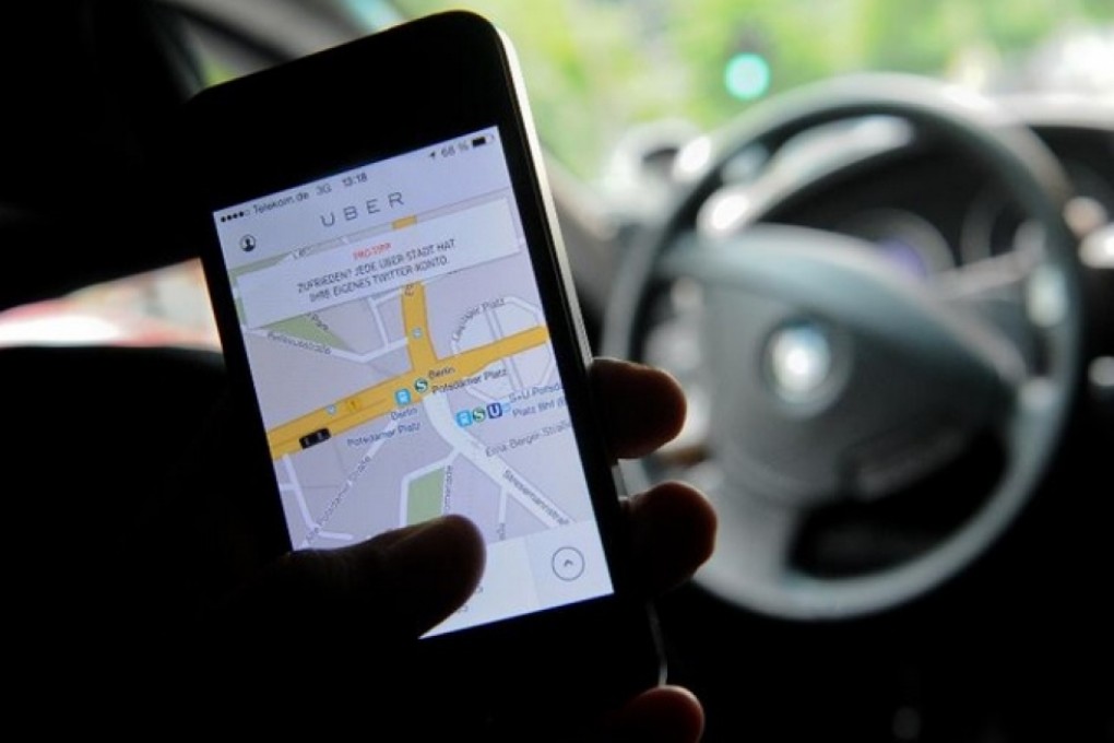 US-based Uber is gaining popularity in India, especially among young, urban workers who use its smartphone app to connect with and pay for local drivers. Photo: AFP