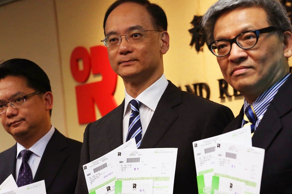 Wong Kuen-fai (centre) Commissioner of Inland Revenue at today's press conference. Photo: Felix Wong