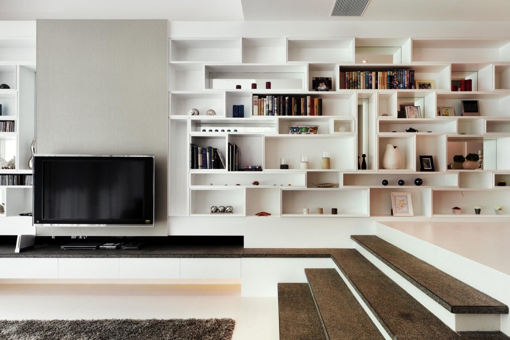 SID's custom-made shelving in a split-level Yuen Long house. Photo: SID