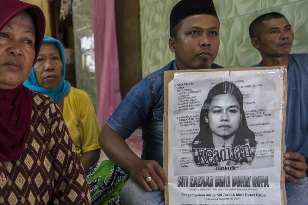 Family members of beheaded Indonesian maid Siti Zainab, who was executed in April after being convicted of stabbing and beating Saudi woman Noura al-Morobei to death in 1999. Photo: AFP