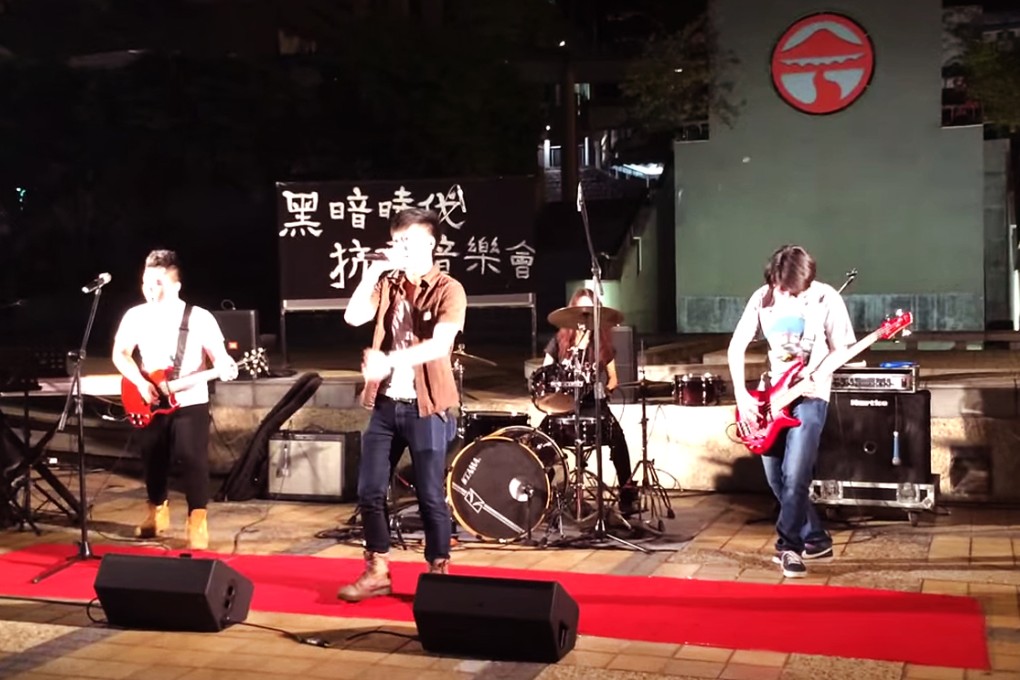 Following the performance, Philip Lau Chun-lam (centre) was warned by the university's president Professor Leonard Cheng Kwok-hon that he could be kicked out if he "damages the university's reputation" again. Photo: Screenshot via Youtube