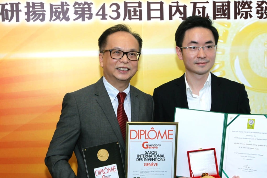 Andrew Ip (left) and George Ho, of Polytechnic University, won an award for the system that can make drivers' lives easier. Photo: Franke Tsang