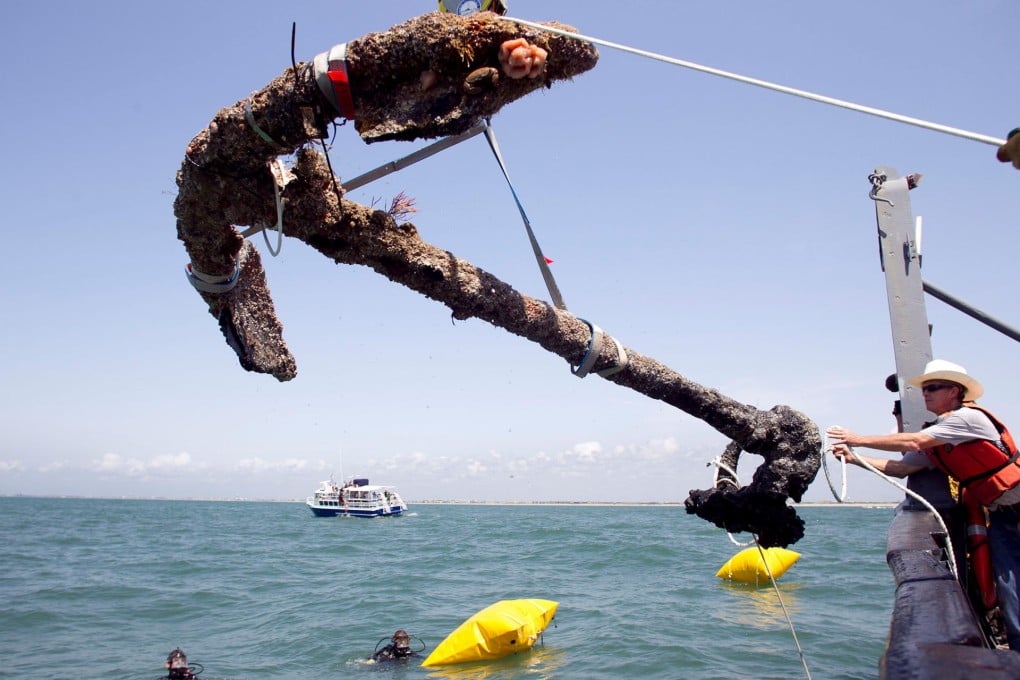 A 1,360kg anchor from Blackbeard's flagship is recovered.Photo: AP