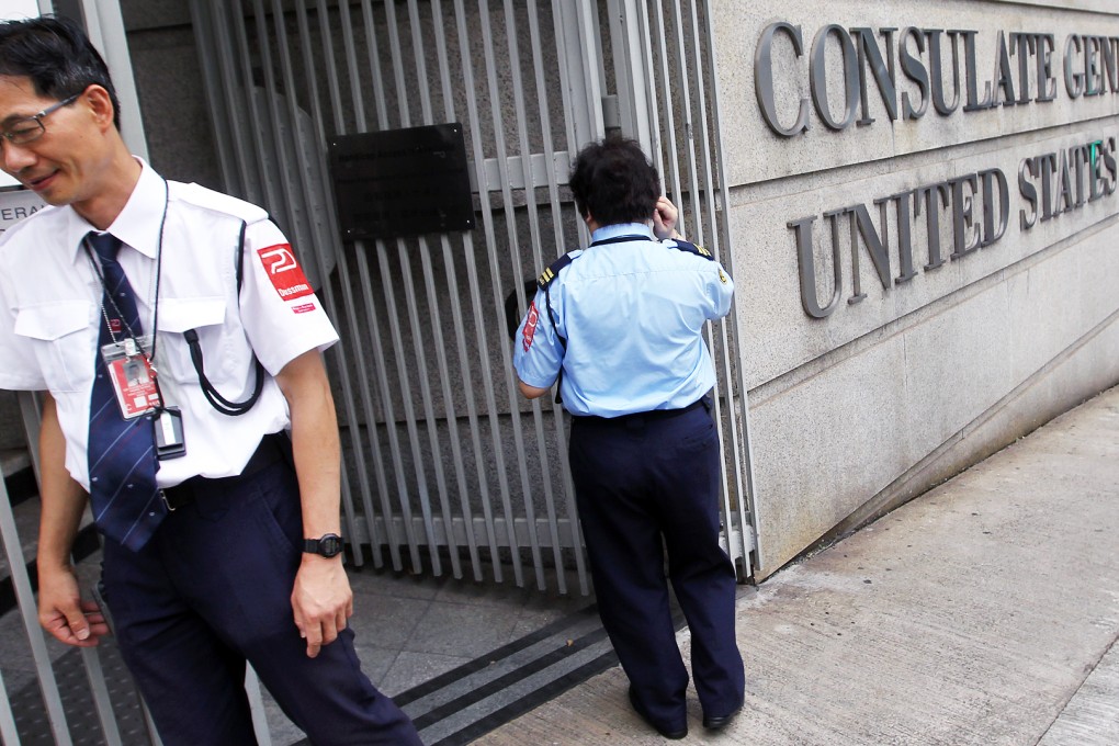 Security guards outside the Consulate General of the United States Hong Kong and Macau in Central. Photo: Edward Wong