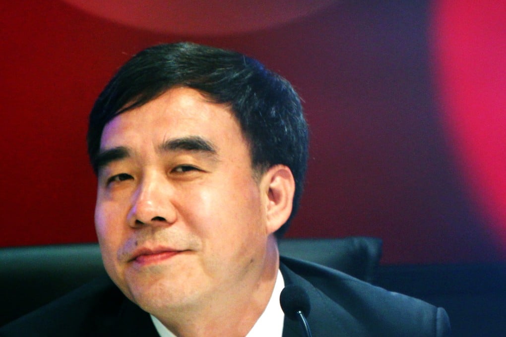 Bank of China's chairman Tian Guoli was the biggest earner among executives at the big four banks on the mainland last year, according to figures released by the lenders. Photo: Jonathan Wong