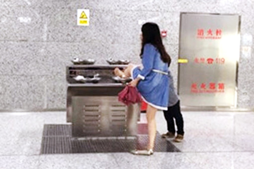 The woman photographed with a foot in the drinks fountain. Photo: SCMP Pictures