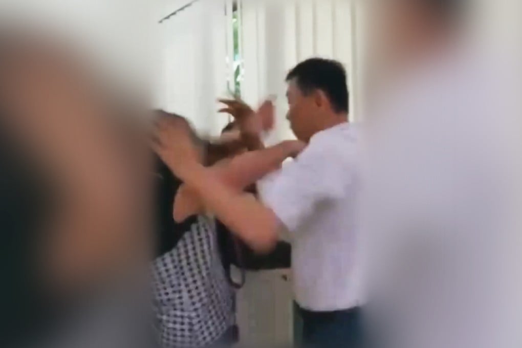 Screen grab of the video shows the man and two women in quarrel. Photo: YouTube