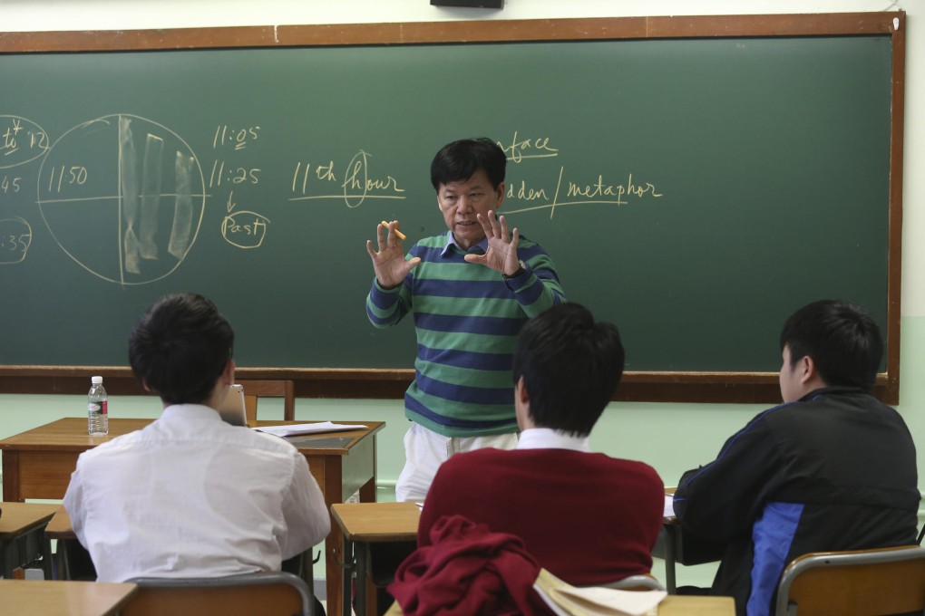 Philip Yeung teaches English to Form Five students at Semple Memorial Secondary School. Photo: K.Y. Cheng