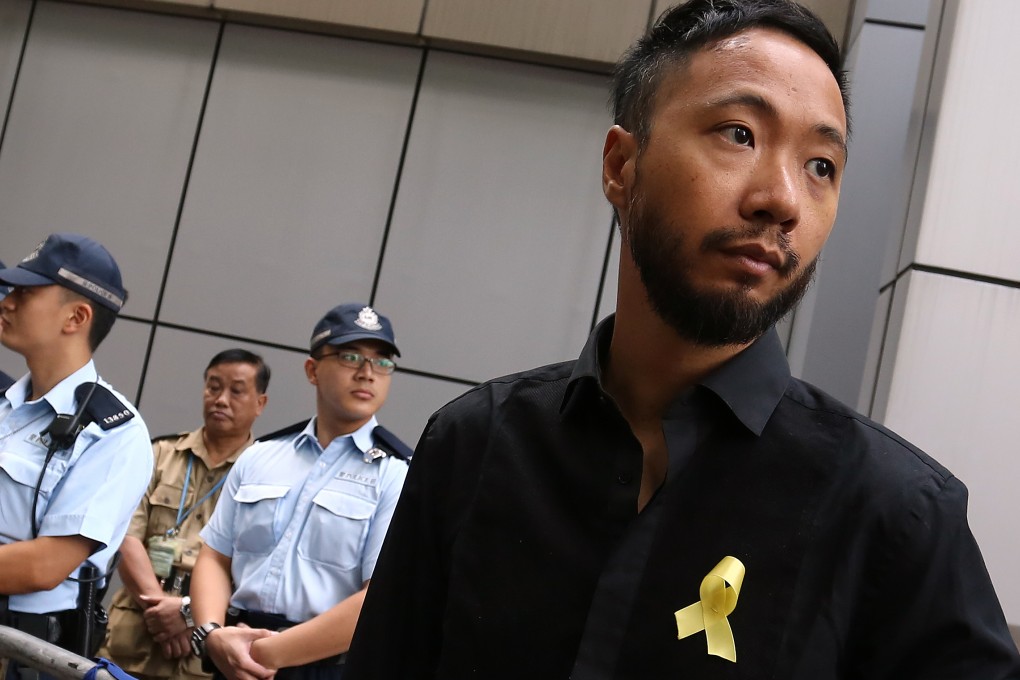 Activist Ken Tsang has called on the police to reveal the names of the officers who allegedly beat him. Photo: Jonathan Wong