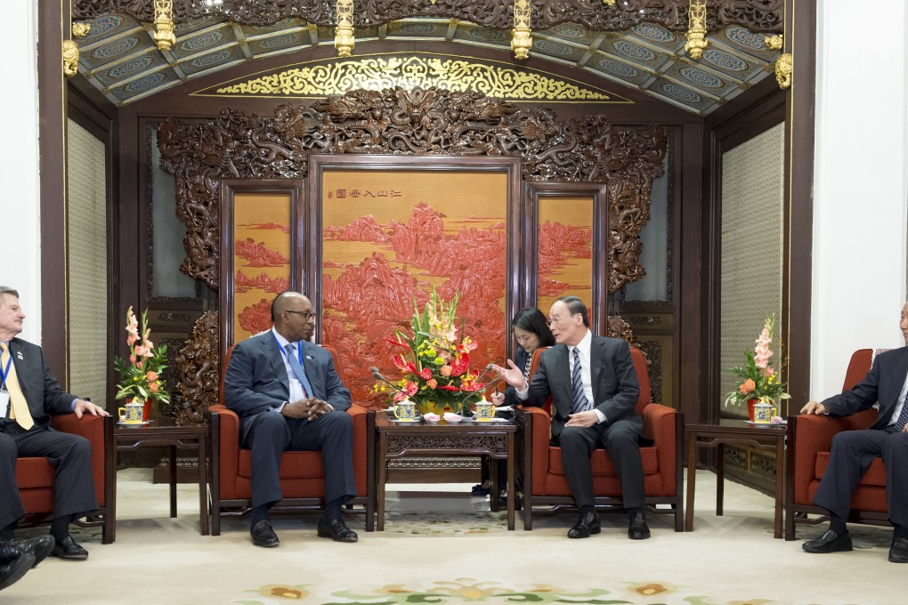 Wang Qishan (2nd R), secretary of the CPC Central Commission for Discipline Inspection (CCDI), meets with a U.S. delegation composed of members from the Democratic Party and the Republican Party, in Beijing. Photo: Xinhua