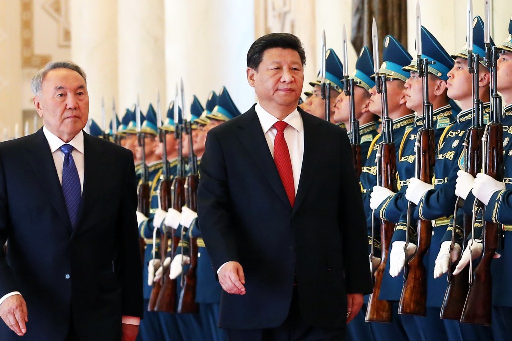 Chinese President Xi Jinping (front right) attends a welcoming ceremony held by Kazakh President Nursultan Nazarbayev in Astana, Kazakhstan. Photo: Xinhua