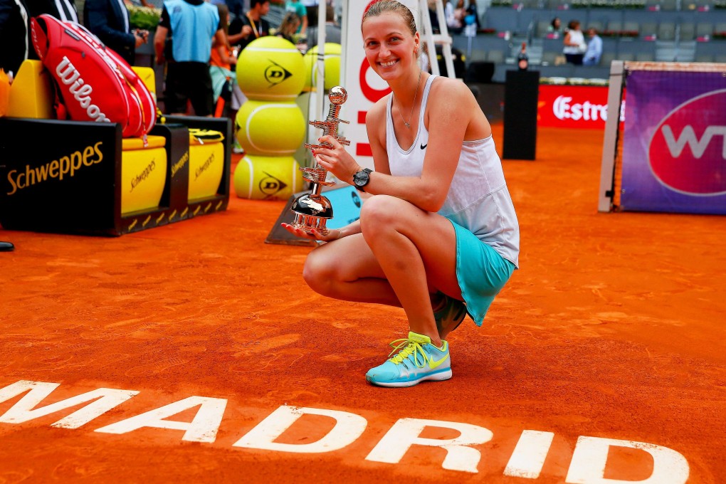 Czech Republic's Petra Kvitova poses with her trophy after beating Russia's Svetlana Kuznetsova in their final at the Mutua Madrid Open. Photo: EPA