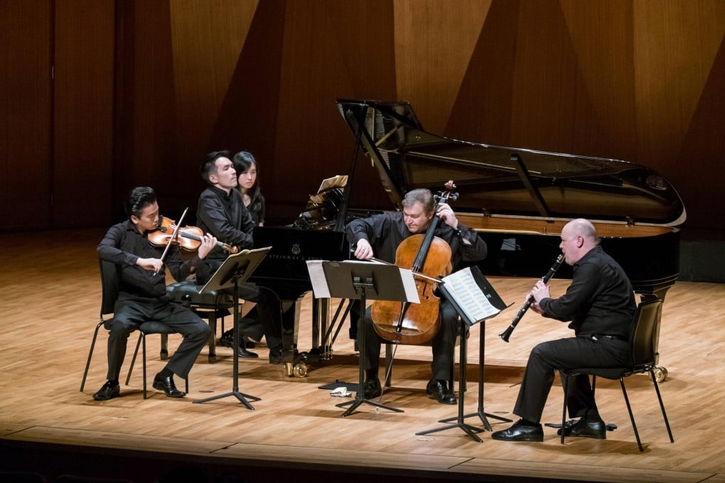 Jing Wang (violin), Warren Lee (piano), Richard Bamping (cello) and  Andrew Simon (clarinet).