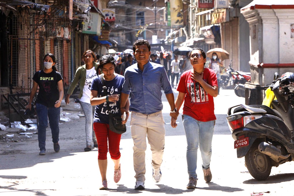 'The one-storey building began shaking severely. I saw the building in front swaying left and right and then crack.' Photo: AP