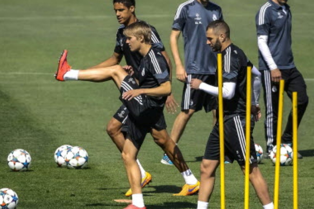 Real Madrid players go through their paces at the Valdebebas Sports Complex ahead of their Champions League semi-final, second leg against Juventus. Photo: EPA