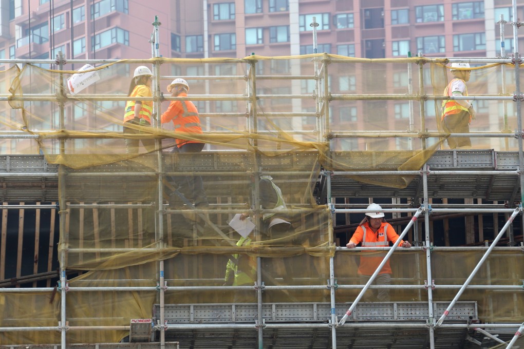 Work proceeds at the West Kowloon terminus of the high-speed rail link. The project may now cost up to HK$90 billion. Photo: Felix Wong