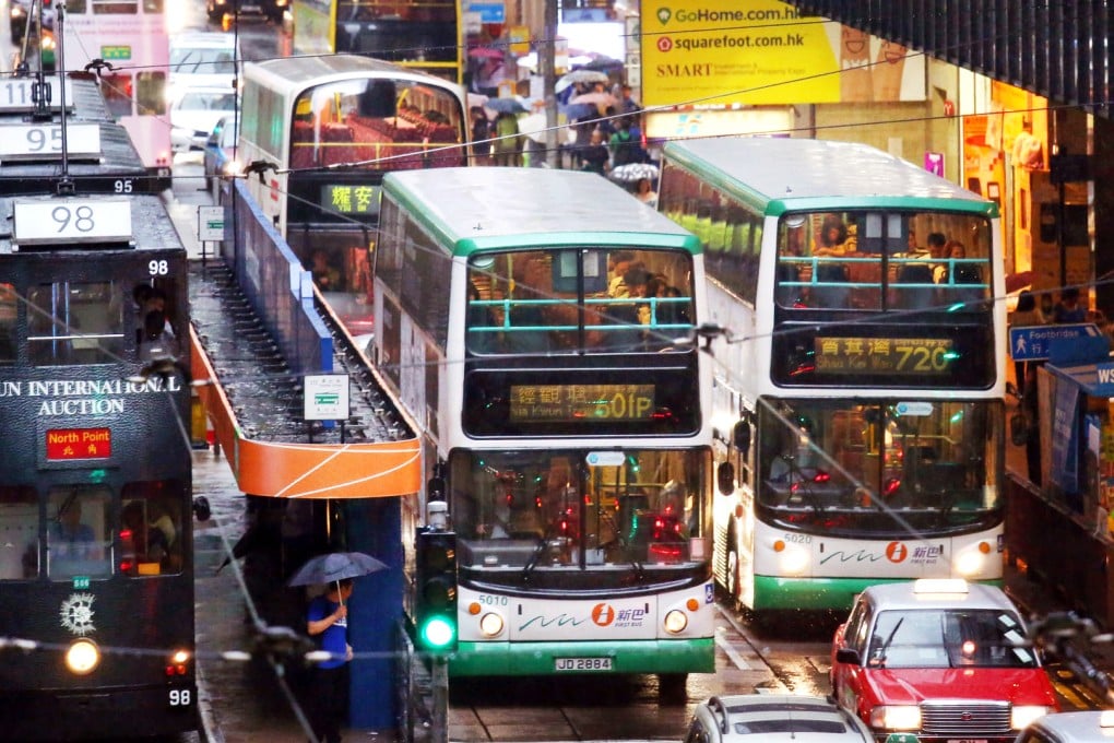 Buses become stuck in a traffic jam on Des Voeux Road Central, increasing emissions. Photo: Nora Tam