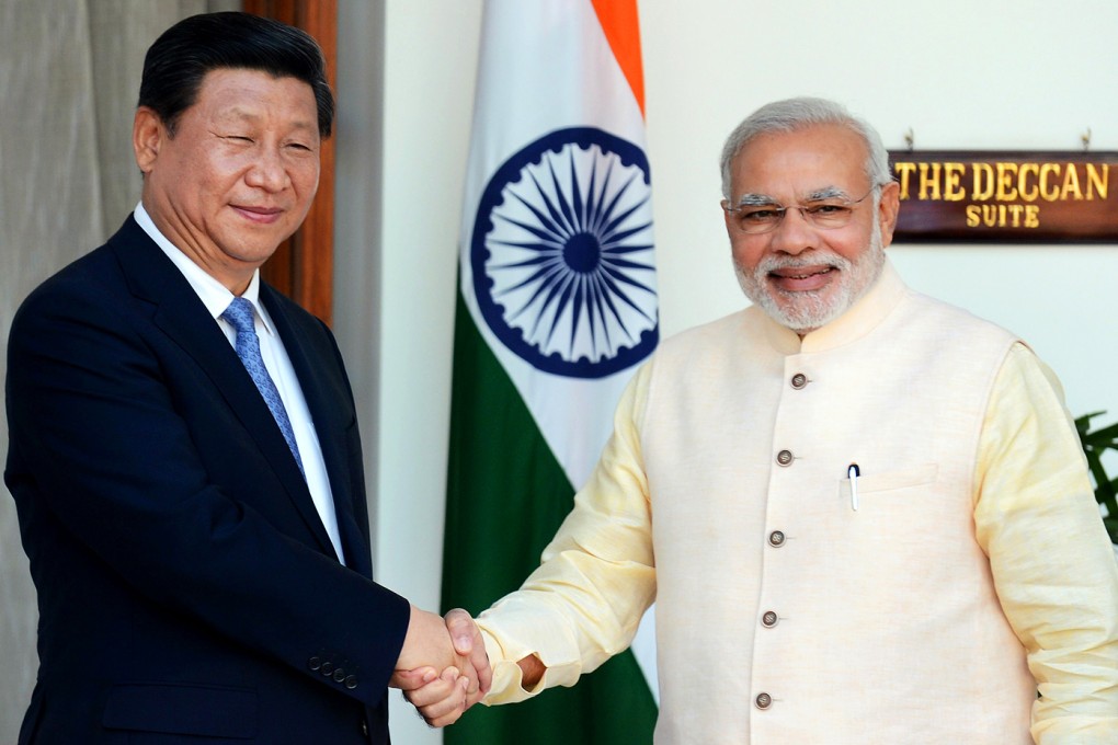 President Xi Jinping (left) is welcomed by Indian Prime Minister Narendra Modi during his visit in September. Photo: AFP