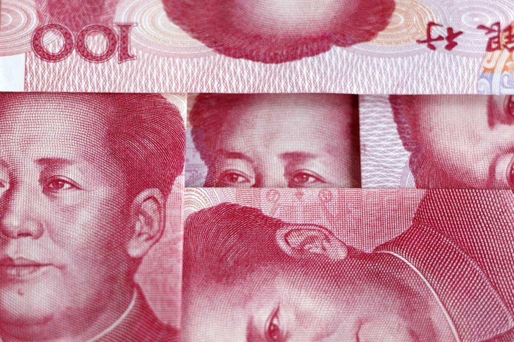 Chinese yuan bank notes are piled on top of each other as the currency strengthened for the second day running on Wednesday. Photo: EPA
