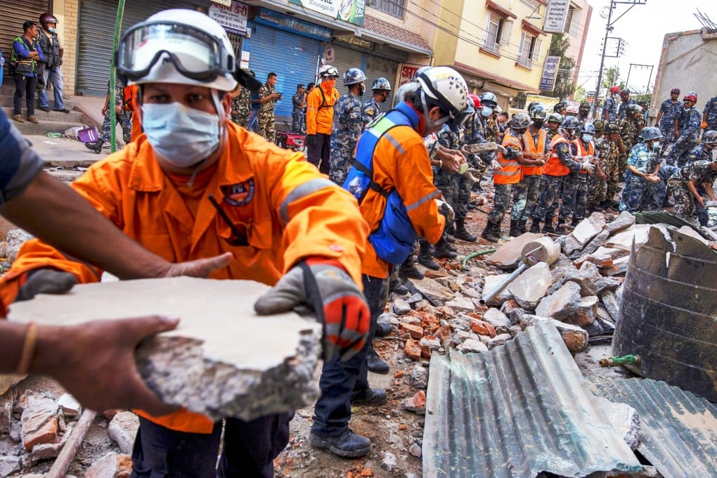 Military personnel remove debris in a search for survivors in Kathmandu. Photo: Reuters