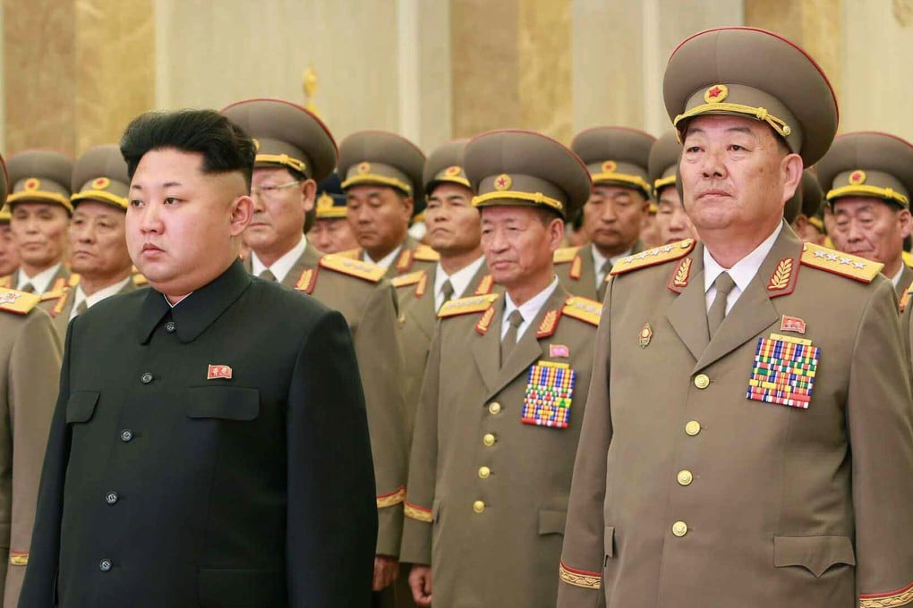 North Korean Defence Minister Hyon Yong-chol (right) with North Korean leader Kim Jong-un at Kumsusan Palace in Pyongyang on February 16. Photo: AFP