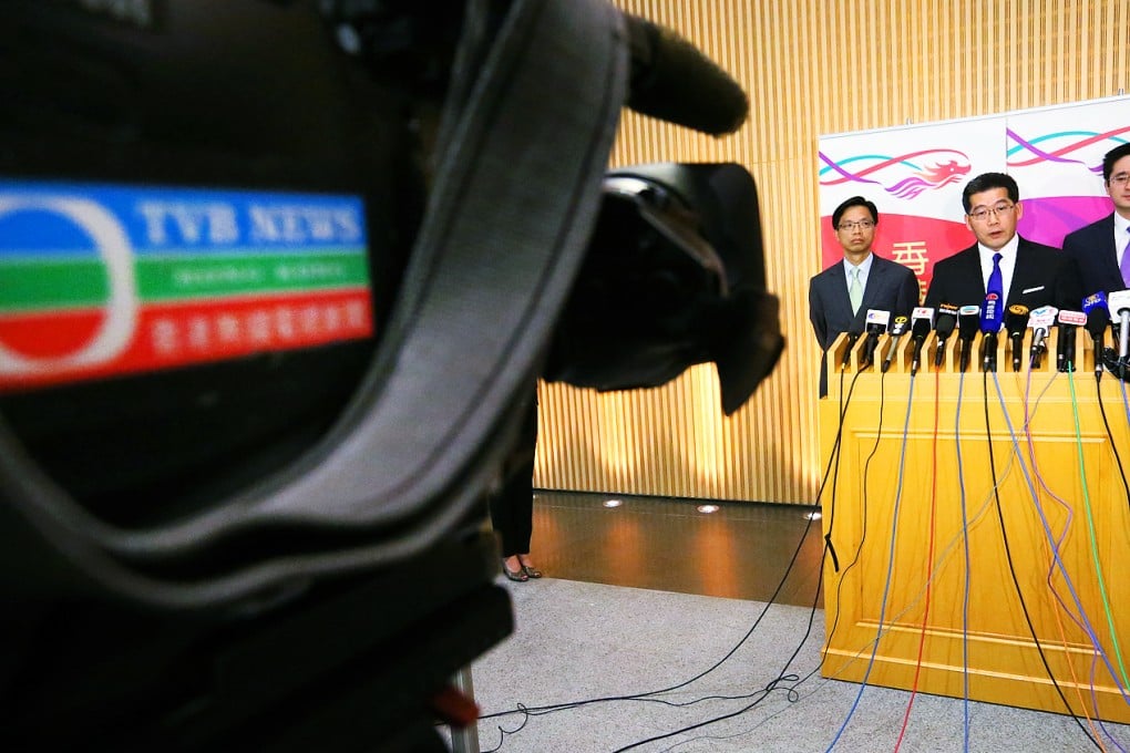 (From left) Godfrey Leung King-kwok, Under Secretary for Commerce and Economic Development; Gregory So Kam-leung, Secretary for Commerce and Economic Development; and Bernard Chan Pak-li, Political Assistant to Secretary for Commerce and Economic Development, meet the media at Tamar, on the renewal of TVB's free-to-air licence. Photo: Nora Tam