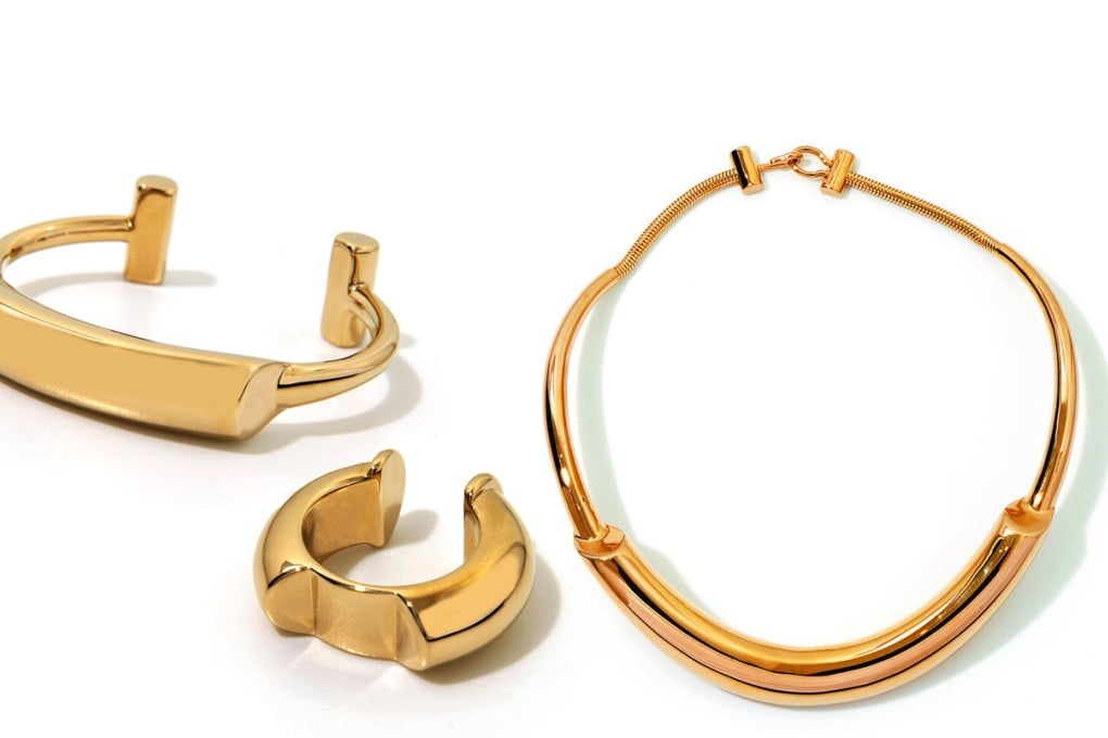 What to buy: Le Sac 11 from Armani, funky floral shoes by Prada