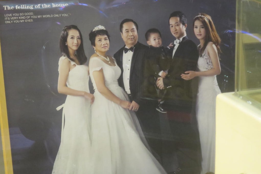 A family wedding photo in a studio in Guangdong. Why are the happy couple middle-aged and who are the people on either side, the writer wonders. Photo: Cecilie Gamst Berg