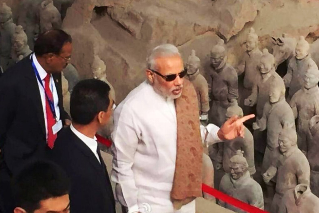 Indian Prime Minister Narendra Modi visits the site of the Terracotta Army in Xian on Thursday on the first day of his visit to China. Photo: Xinhua weibo