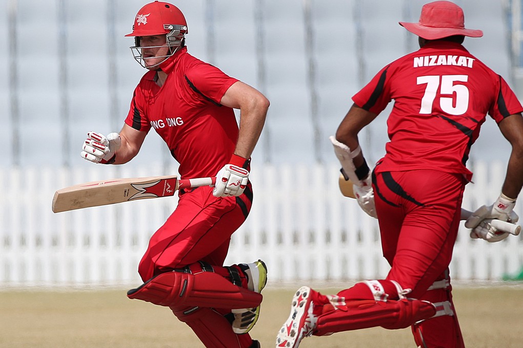 Jamie Atkinson (left) and Nizakat Khan of Hong Kong. Khan made a half century in the first innings against Namibia. Photo: Nora Tam