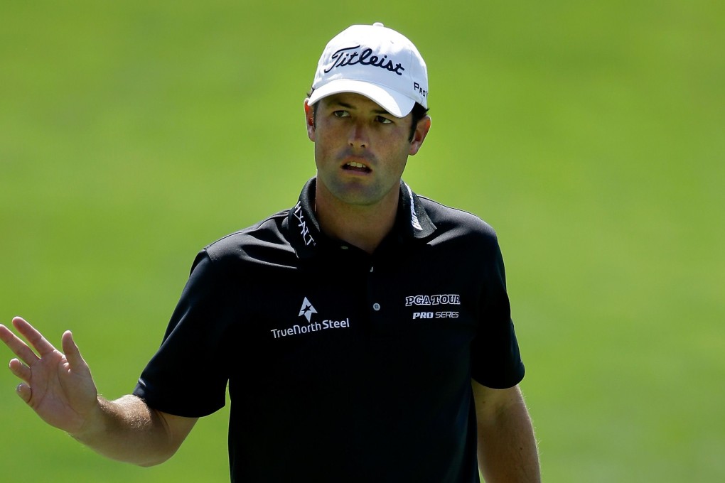Robert Streb waves to the galleries. Photo: AFP
