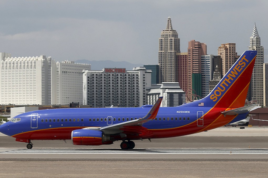 A Southwest Airlines passenger jet is seen with the Las Vegas strip in the background. Photo: Reuters