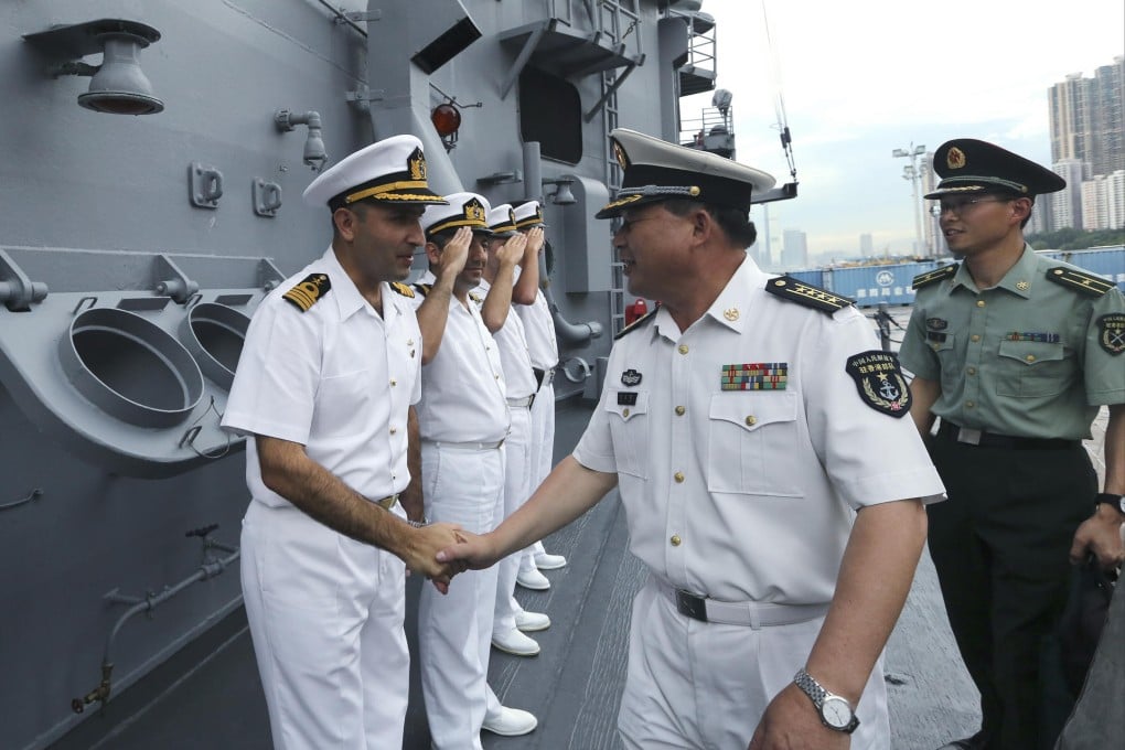 PLA visitors are welcomed aboard the TCG Gediz. Photo: Sam Tsang