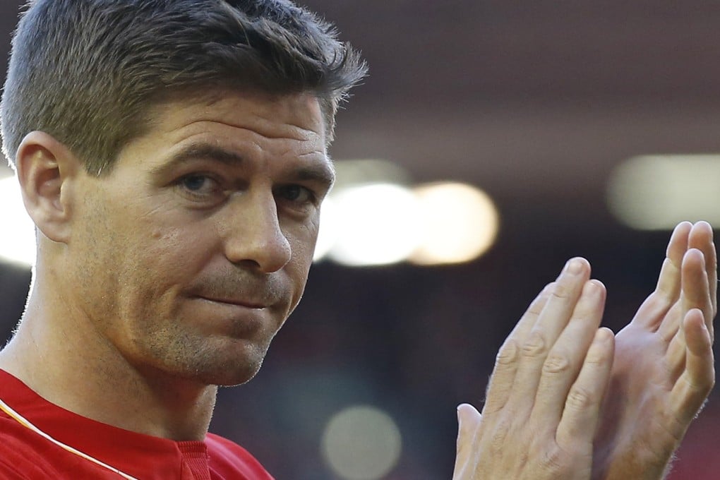 Steven Gerrard acknowledges the fans. Photo: AP