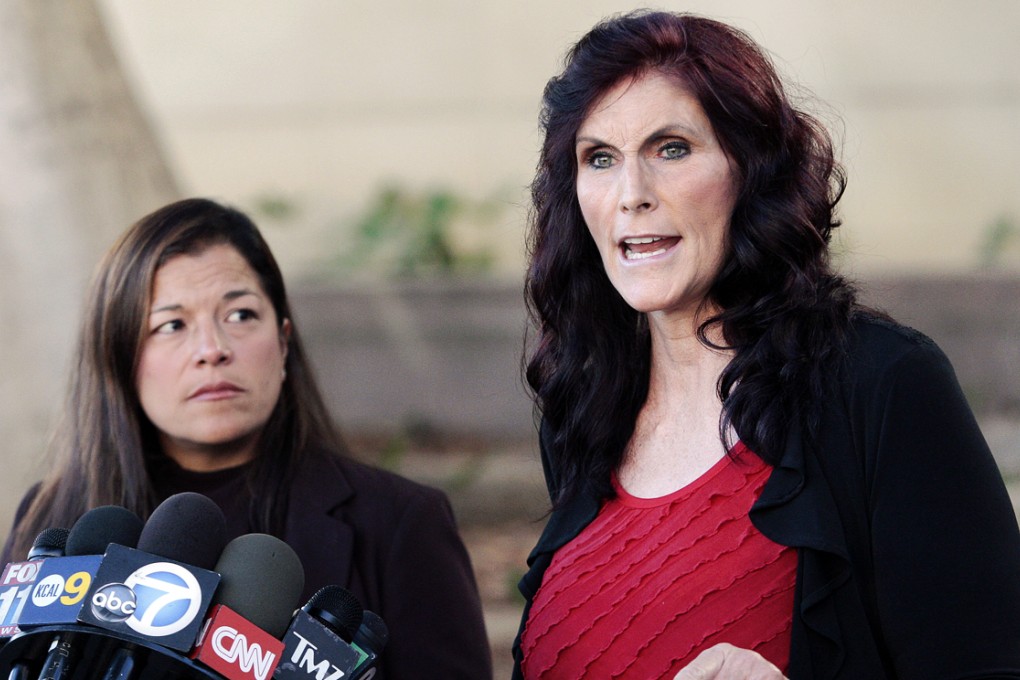 Cindy Lee Garcia (right), one of the actresses in "Innocence of Muslims," and attorney M. Cris Armenta hold a news conference in Los Angeles in 2012 asking a judge to issue an injunction demanding a 14-minute trailer for the film be pulled from YouTube. Photo: AP
