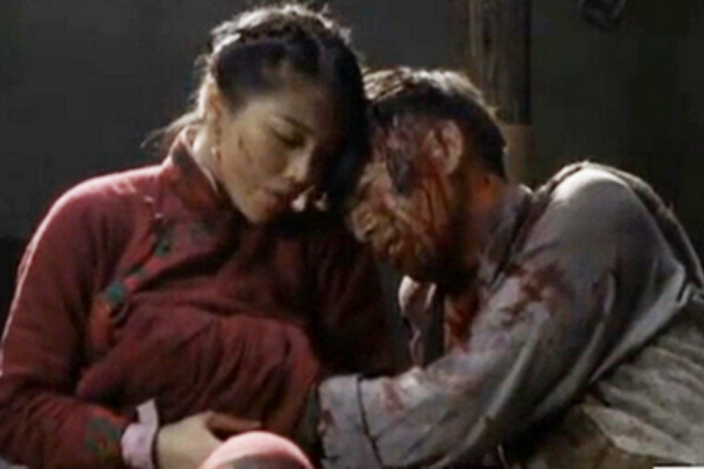 Actress Ge Tian (left), pictured here playing the lover of a jailed communist in a war-themed soap opera, hides a grenade underneath her dress.