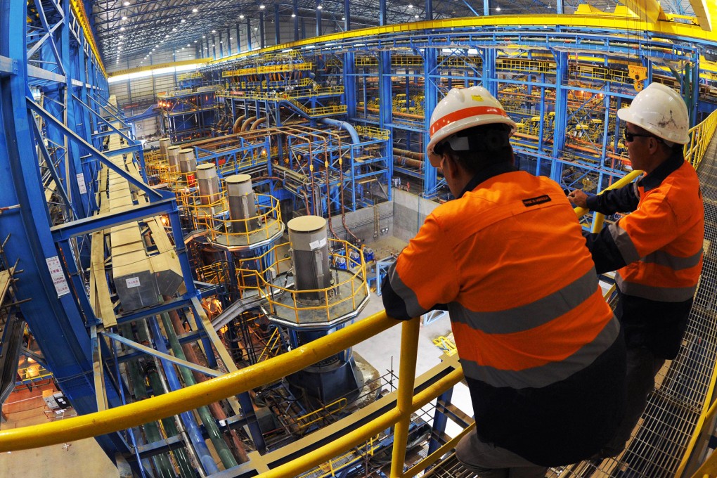 Mongolian workers at the ore processing facility in the Oyu Tolgoi copper mining project in the Gobi desert in Mongolia. Photo: AFP