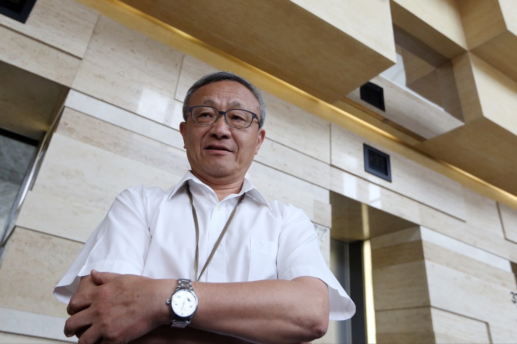 Chinachem Group Chairman Kung Yan-sum, the younger brother of Nina Wang Kung Yu-sum, speaks to the media at Nina Tower in Tsuen Wan. Photo: Sam Tsang